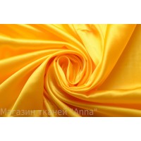 Атласный шелк-стрейч в насыщенном желтом цвете