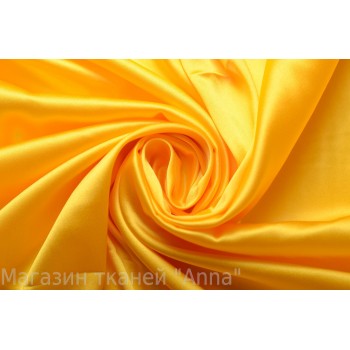 Атласный шелк-стрейч в насыщенном желтом цвете