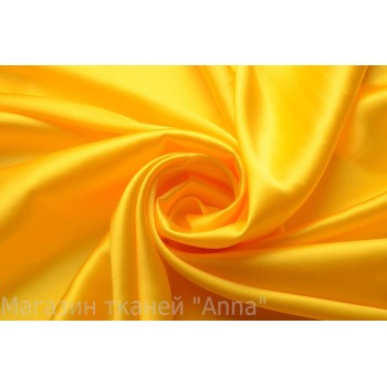 Шелк атласный однотонный теплого насыщенного желтого цвета