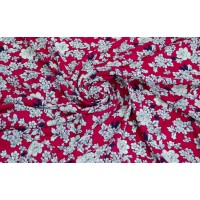 Светлые мелкие цветочки на ярком красном фоне штапеля