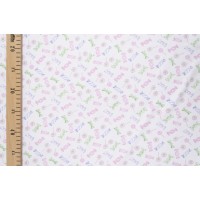 Хлопковый трикотаж с детским принтом - конфетки на белом фоне